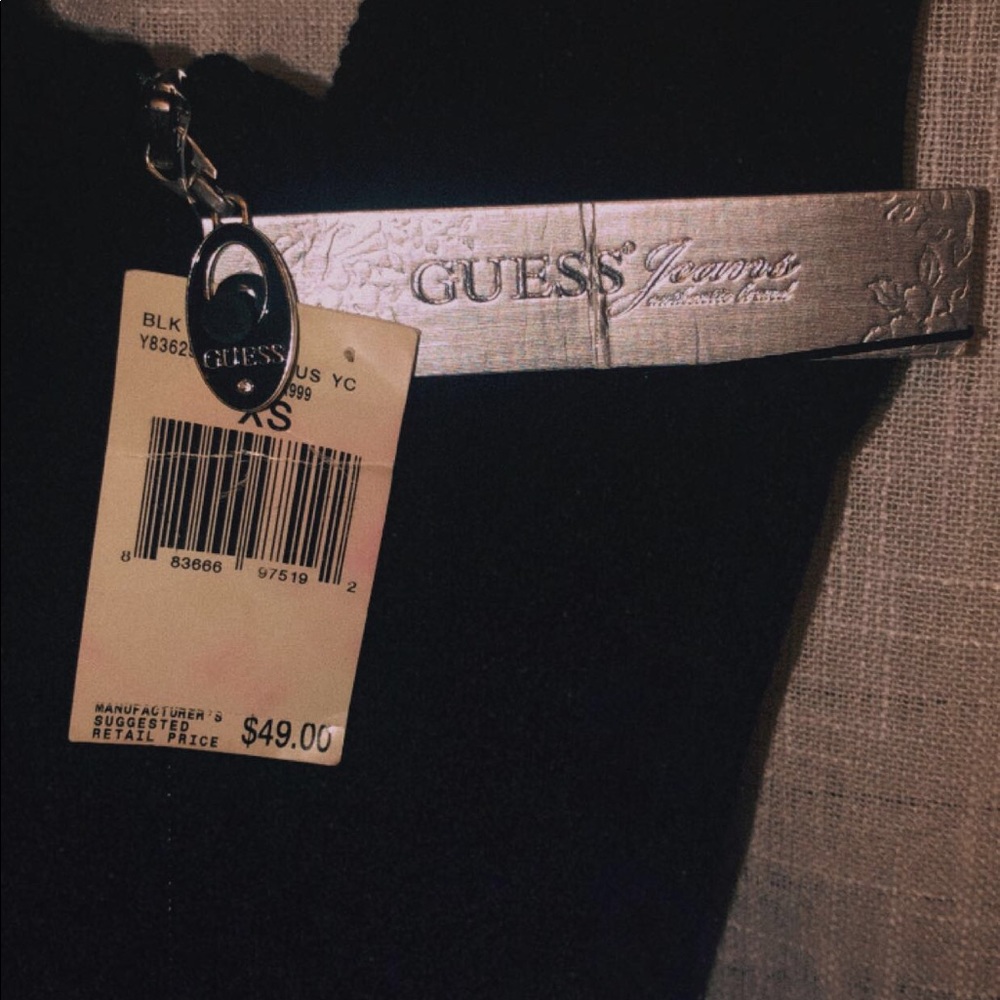 black “Guess” haltertop